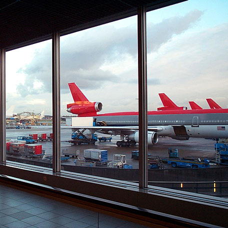 airport terminal windows and jet aircraft